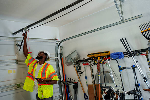 Professional Garage Door Panel Replacement technician working in East Atlantic Beach, NY